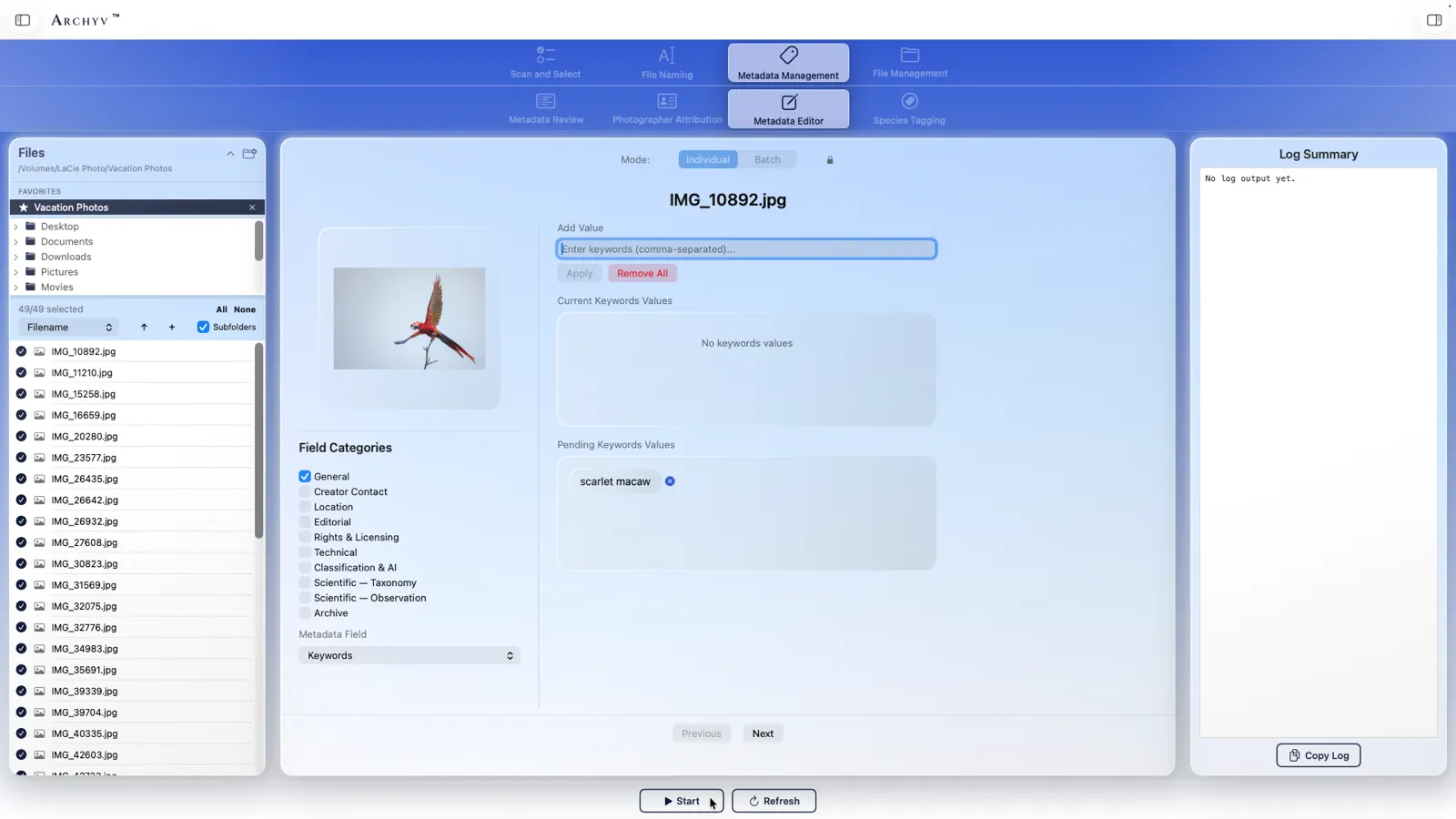 The Archyv Metadata Editor in Individual mode on one photo of a scarlet macaw: the Keywords field selected, no current keywords, and the keyword scarlet macaw pending.